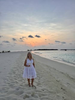 me in white dress on sandbank